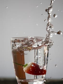 Strawberry Water splash in glass