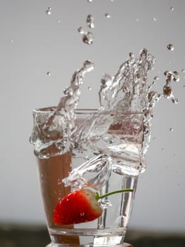 Strawberry Water splash in glass