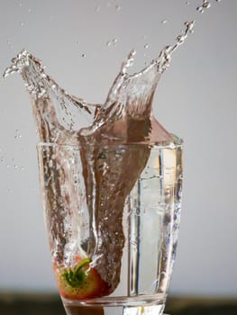 Strawberry Water splash in glass