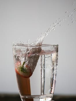 Strawberry Water splash in glass