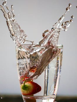 Strawberry Water splash in glass