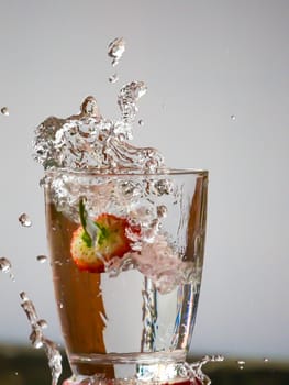 Strawberry Water splash in glass