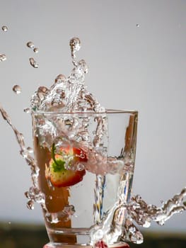 Strawberry Water splash in glass