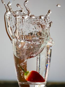 Strawberry Water splash in glass