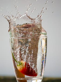 Strawberry Water splash in glass