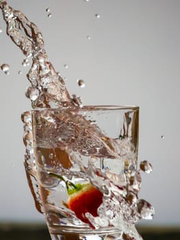 Strawberry Water splash in glass
