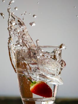 Strawberry Water splash in glass