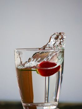 Strawberry Water splash in glass