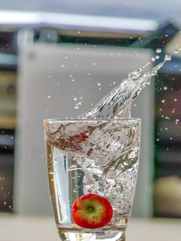Strawberry Water splash in glass