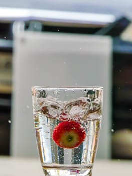 Strawberry Water splash in glass