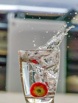 Strawberry Water splash in glass