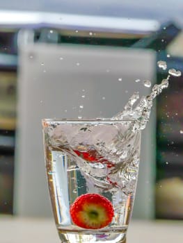 Strawberry Water splash in glass