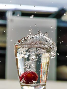 Strawberry Water splash in glass