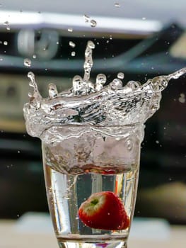 Strawberry Water splash in glass