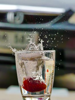 Strawberry Water splash in glass