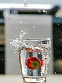 Strawberry Water splash in glass