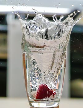 Strawberry Water splash in glass