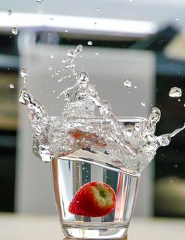 Strawberry Water splash in glass