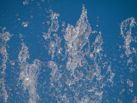 Water splash With blue background