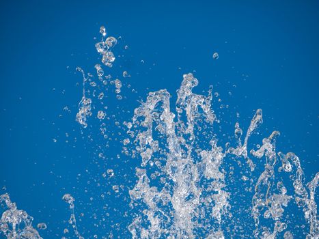 Water splash With blue background