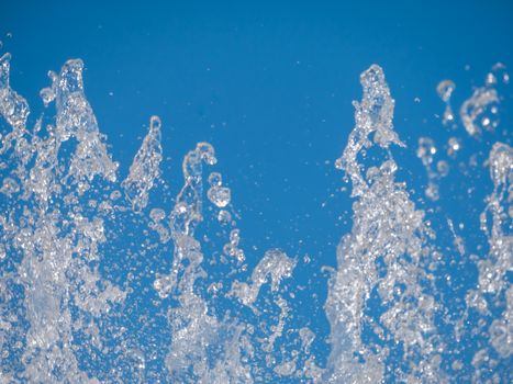 Water splash With blue background