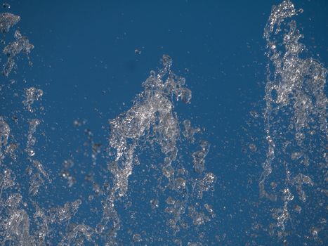 Water splash With blue background