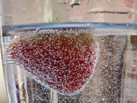 Strawberry Water splash in glass