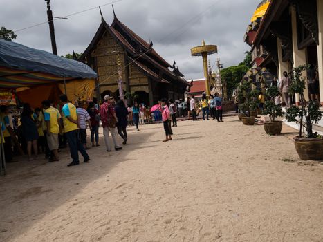 Lampang - December 5 : Don Muang Airport on December 5 , 2015 People in holiday  travel which horse carriage in temple Phrathat Lampang Luang in Lampang, Thailand Thailand.