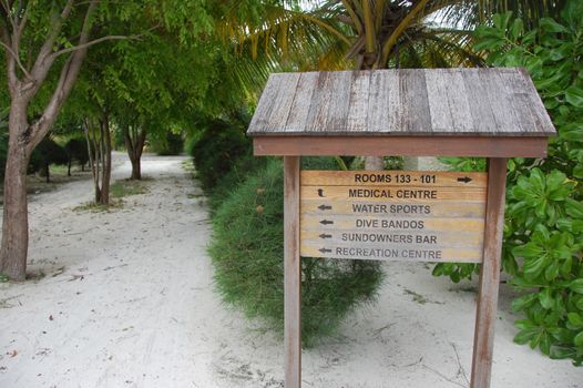 Timber direction signs at Bandos Island Maldives, Asia, Indian Ocean