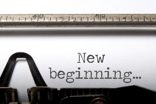 New beginning printed on an old typewriter 