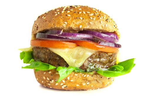 Freshly made cheeseburger over a white background 