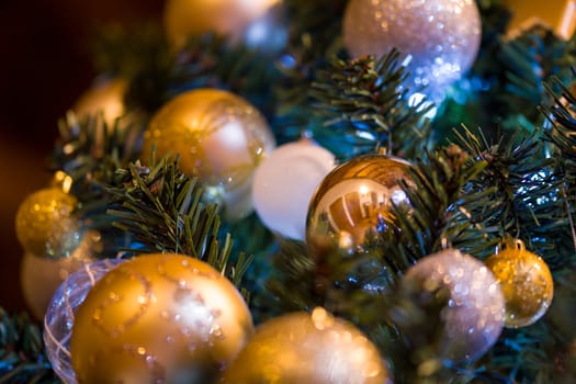 Close up of a decorated Christmas Tree with Baubles and other colourful decorations.