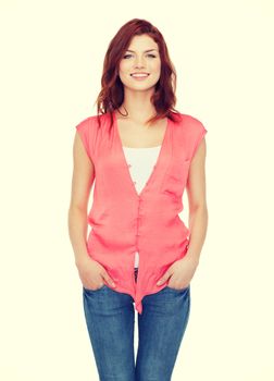 happiness and people concept - smiling teenage girl in casual clothes