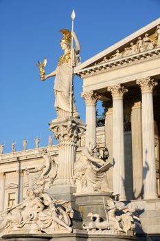 The Austrian Parliament and statue of Pallas Athena in Vienna, Austria