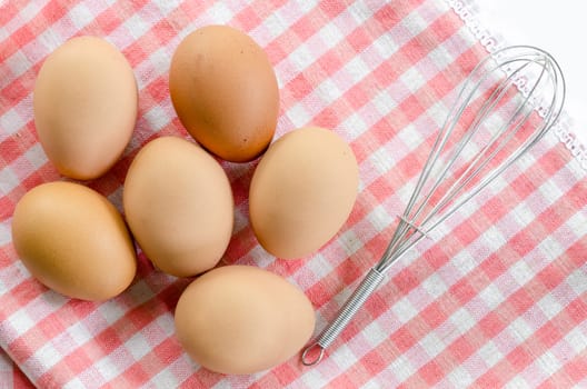 top view of eggs on tablecloth.