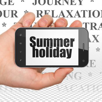 Tourism concept: Hand Holding Smartphone with  black text Summer Holiday on display,  Tag Cloud background