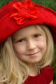 Girl in the red hat.