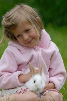 Small girl and the white rabbit.
