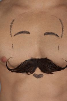 male torso with moustache and beard at chest