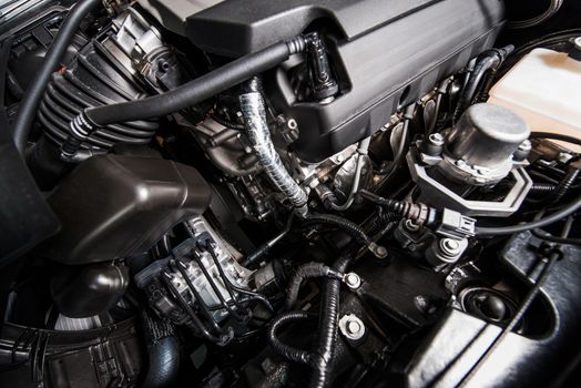 Modern Gasoline Car Engine Closeup Photo. Modern Transportation Technology. Compact Car Engine.