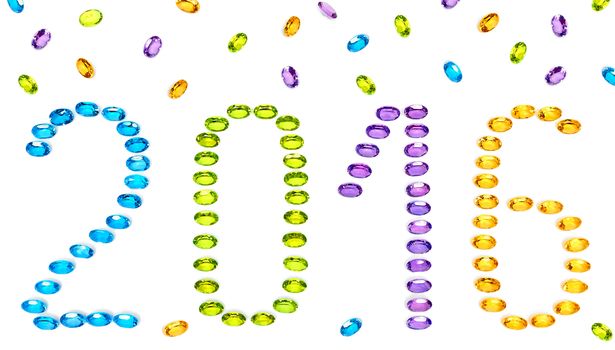 New Year 2016. Christmas. Jewelry digits, colorful precious stones placer closeup isolated. Gems Topaz, Amethyst, Citrine, Peridot, vivid multicolored unusual greeting card. Sparkling happy holiday 