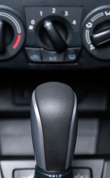 Modern car interior. Closeup of gear lever