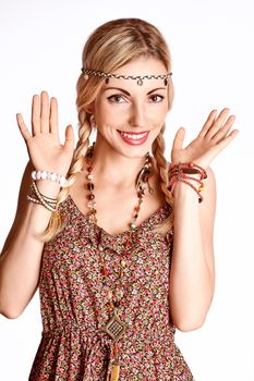 Beauty portrait of boho joyful woman surprised looks and smiling, people, on white. Hippie young positive girl. Attractive blond playful girl with pigtails in floral fashion sundress, romantic style