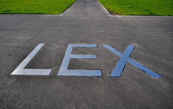 metal lettering LEX on the pavement on the promenade in front of hotel New York in Rotterdam Holland