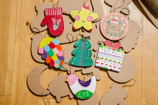 Cardboard toys for the Christmas tree or Christmas garland. Christmas decorations. Selective Focus