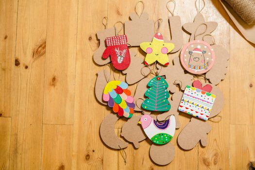 Cardboard toys for the Christmas tree or Christmas garland. Christmas decorations. Selective Focus