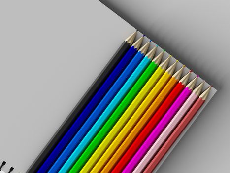 notebook with colored pencils on White background, stationary object