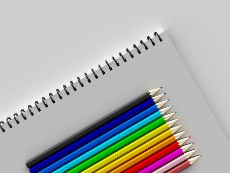 notebook with colored pencils on White background, stationary object