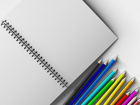 notebook with colored pencils on White background, stationary object