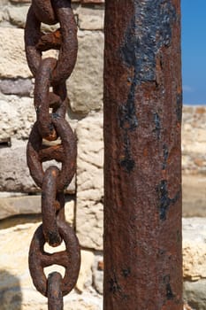 Front view an old iron chain.